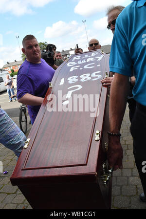 Bury fans deliver a symbolic coffin reading 'R.I.P Bury F.C. 1885 ?' at Gigg Lane, home of Bury FC. Stock Photo