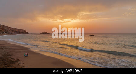 The sunset under the beautiful blue sky on beach Stock Photo