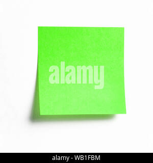 Vibrant green sticky note with shade isolated on white background, front view adhesive paper note with copy space Stock Photo