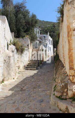 pathway through homes in Hydra Greece Stock Photo