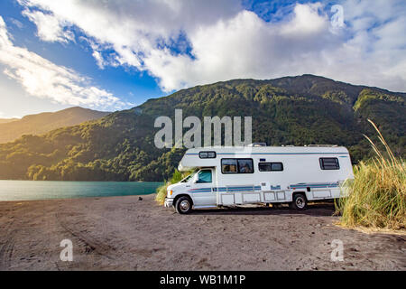 Motorhome in Chilean Argentine mountain Andes. Family trip travel vacation on Motorhome RV in Andes. Ensenada, Chile