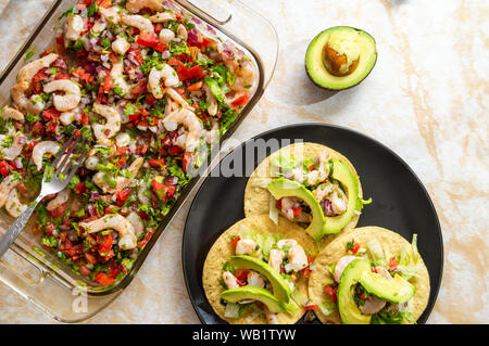 Shrimp ceviche, made with fresh ingredients, served with tostadas. Flat lay, concept for food blogs, restaurant menus, travel, Latin America, seafood, Stock Photo