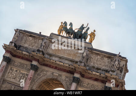 PARIS, FRANCE - AUGUST 03, 2018:  The quadriga on top of the Arc de Triomphe du Carrousel, often referred to as the Horses of Saint Mark Stock Photo