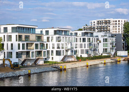 Modern houses built at the river Spree in Berlin, Germany Stock Photo