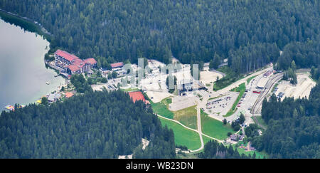 View from the mountain station to the valley station of the cable car to the Zugspitze, with a part of the Eibsee lake. Stock Photo