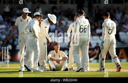 England's Ben Stokes (centre) celebrates taking the wicket of Australia's Matthew Wade with team-mates including Jofra Archer (centre left) during day two of the third Ashes Test match at Headingley, Leeds. Stock Photo