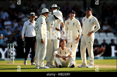 England's Ben Stokes (centre) celebrates taking the wicket of Australia's Matthew Wade with team-mates during day two of the third Ashes Test match at Headingley, Leeds. Stock Photo