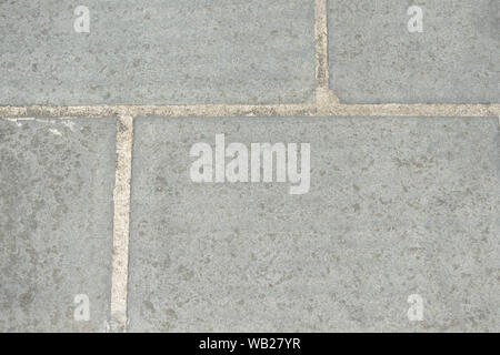 Gray paving slabs closeup, top view. Abstract background Stock Photo