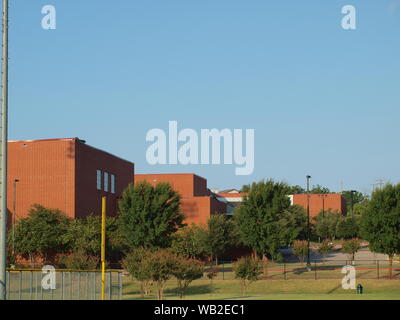 Newer,large,on-a-hillside High School with soccer, football, baseball Stock Photo