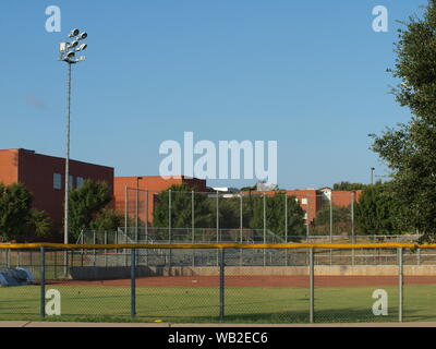 Newer,large,on-a-hillside High School with soccer, football, baseball Stock Photo