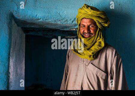 Tuareg man in his house, portrait, Assekrem, Tamanrasset, Hoggar mountains, Algeria Stock Photo
