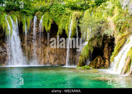 Landscape of green lake and waterfalls in Plitvice Lakes National Park, Croatia Stock Photo