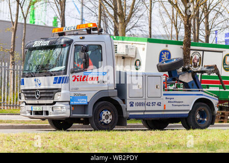 NUREMBERG / GERMANY - APRIL 14, 2019: Breakdown service truck drives on a street in Nuremberg. Stock Photo