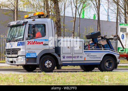 NUREMBERG / GERMANY - APRIL 14, 2019: Breakdown service truck drives on a street in Nuremberg. Stock Photo