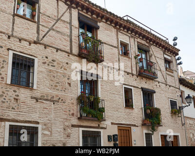 TOLEDO, SPAIN - APRIL 24, 2018: Traditional picturesque architecture in Toledo. Stock Photo