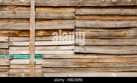 Horizontal wooden texture background. Facade of a log house, copy space. Wooden texture background Wall of blockhouse Stock Photo