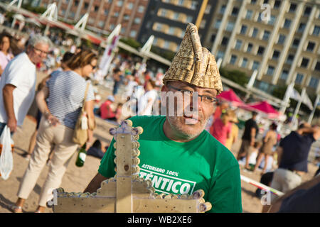 Gijón, Spain; August 23, 2019: Traditional Natural Cider Fest in Gijón, Asturias, where 9721 persons beated the former record of persons 'escanciando' Stock Photo