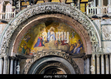 Mosaics on the west façade of the Basilica di San Marco (St Mark's Basilica) at night.  Saint Mark's Square, Venice, Italy Stock Photo