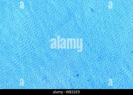 Blue water surface with light waves pattern top view. Texture and background Stock Photo