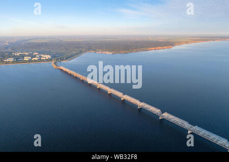 Long 'Imperial' bridge over Volga river in Ulyanovsk, Russia aerial high angle view. Stock Photo
