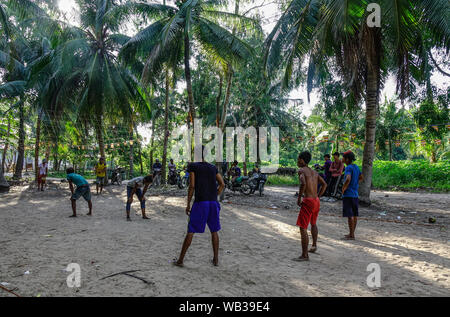 Can Tho, Vietnam - Sep 2, 2017. Local men playing volley ball at the village in Can Tho, Mekong Delta, Vietnam. Stock Photo