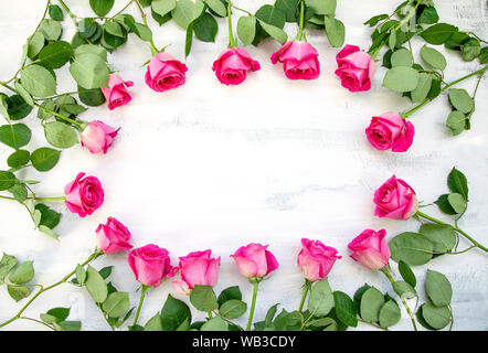 Circle flatlay Frame made of pink rose flowers Stock Photo