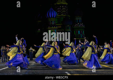 Moscow, Russia. 23rd Aug, 2019. Dancers perform during the opening day of 'Spasskaya Tower' International Military Music Festival in Moscow, Russia, on Aug. 23, 2019. The annual military music festival opened on Friday on the Red Square in Moscow, and will run until September 1. Credit: Bai Xueqi/Xinhua/Alamy Live News Stock Photo