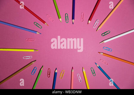 School supplies on pink board background. Education, back to school concept with copy space Stock Photo