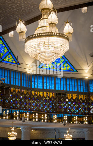 Masjid Negara mosque chandelier and colored windows inside Stock Photo