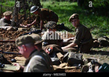 Enthusiasts at the Tanks, Trucks and Firepower show, in the village of Dunchurch in Warwickshire. Stock Photo