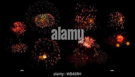 multicolored flashes of festive salute on an isolated black background, six options Stock Photo