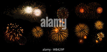 multicolored flashes of festive salute isolated on black background, eight options Stock Photo