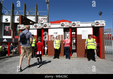 Sheffield United fans make their way to the stadium prior to the Premier League match at Bramall Lane, Sheffield. Stock Photo