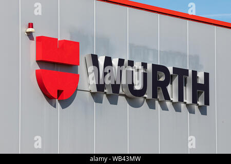 Stade, Germany - August 22, 2019: Signage on wall identifying a WÜRTH dealership. Stock Photo