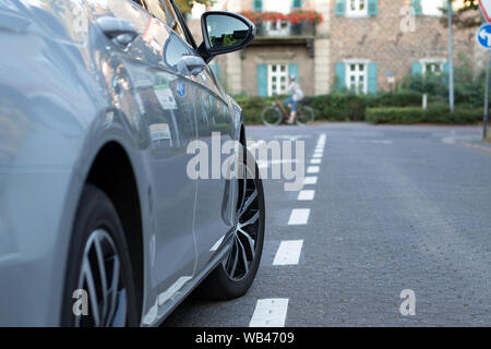 car parkin on bicycle path, forbidden parking Stock Photo