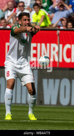 Augsburg, Germany. 24th Aug, 2019. Soccer: Bundesliga, FC Augsburg - 1st FC Union Berlin, 2nd matchday in the WWK-Arena. Augsburg's Rani Khedira gives gesticulating instructions. Credit: Stefan Puchner/dpa - IMPORTANT NOTE: In accordance with the requirements of the DFL Deutsche Fußball Liga or the DFB Deutscher Fußball-Bund, it is prohibited to use or have used photographs taken in the stadium and/or the match in the form of sequence images and/or video-like photo sequences./dpa/Alamy Live News Stock Photo