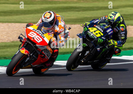 Silverstone Circuit, Silverstone, Northamptonshire. 24th August 2019; Silverstone Circuit, Silverstone, Northamptonshire, England; MotoGP GoPro British Grand Prix, Qualifying; Repsol Honda Team rider Jorge Lorenzo on his Honda RC213V ahead of Monster Energy Yamaha MotoGP rider Valentino Rossi on his Yamaha YZR-M1 - Editorial Use Only Credit: Action Plus Sports Images/Alamy Live News Credit: Action Plus Sports Images/Alamy Live News Stock Photo