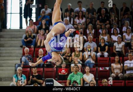 Stuttgart, Germany. 24th Aug, 2019. Gymnastics: 1st World Cup qualification, women in the Scharrena Stuttgart. Elisabeth Seitz performs on uneven bars. Credit: Christoph Schmidt/dpa/Alamy Live News Stock Photo