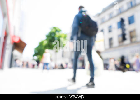Blurred images of a shopping mall on a sunny day. Shopping, leisure and traveling concept. Stock Photo