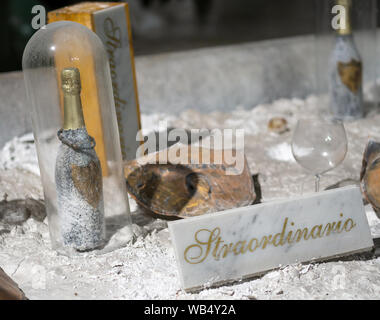 MASSA CARRARA, AUGUST 23, 2019 - lo straordinario sparkling wine matures inside quarry at Fantiscritti. Grapes from the Apuan hills. Exclusive product Stock Photo