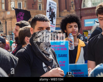 London, UK. 24th August 2019. Anti-fascists meet at Oxford St to oppose a protest at the BBC by Tommy Robinson supporters who claim he is in jail for journalism. He was sentenced to 9 months for 3 offences outside Leeds Crown Court which could have led to the collapse of a grooming gang trial, and has previous convictions for violence, financial and immigration frauds, drug possession and public order offences. Police kept the two groups apart. Robinson supporters were later joined by marchers from Trafalgar Square, and a larger group from Stand Up to Racism came to join Antifa. Peter Marshall Stock Photo