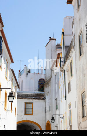 Whitewashed houses in the streets of the medieval city of Évora in the region of Alentejo, Portugal. Stock Photo