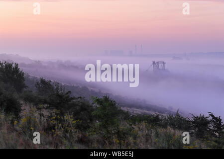 RSPB St Aidan's in Swillington on a misty morning. Oddball the preserved Walking Dragline sits at the entrance. Stock Photo