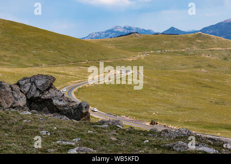 GRAND LAKE, CO, USA-17 JULY 2018:  Above the treeline in Rocky Mtn. National Park, visitors can view the road below.  Elevation here is approx. 14,000 Stock Photo