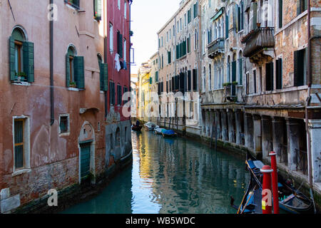 Gondolas and boats on the rivers of Venice. Stock Photo