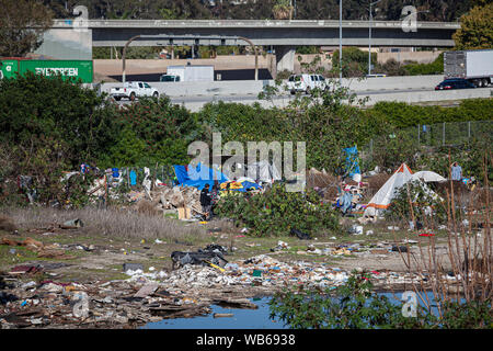 Homeless camp along the Los Angeles River, City of Paramount, South LA, Califortnia, USA, Stock Photo