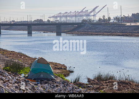 Homless tent along the Los Angeles River, Willow Street, Long Beach, Califortnia, USA, Stock Photo