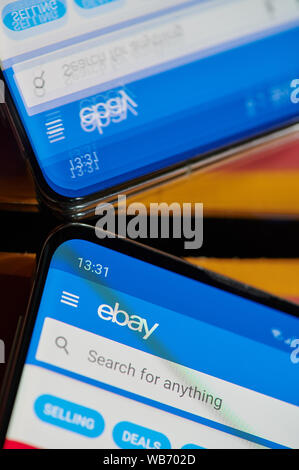 New york, USA - august 24, 2019: Using ebay application on smartphone  macro close up  mirror view Stock Photo