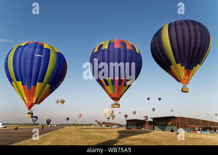 Chambley, France. 4th August, 2019. Hundreds of hot air balloons took off from the Chambley-Bussieres Airbase for the Grand Est Mondial Air Ballons. Stock Photo