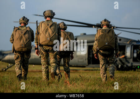 Green Berets assigned to 3rd Special Group (Airborne) prepare to